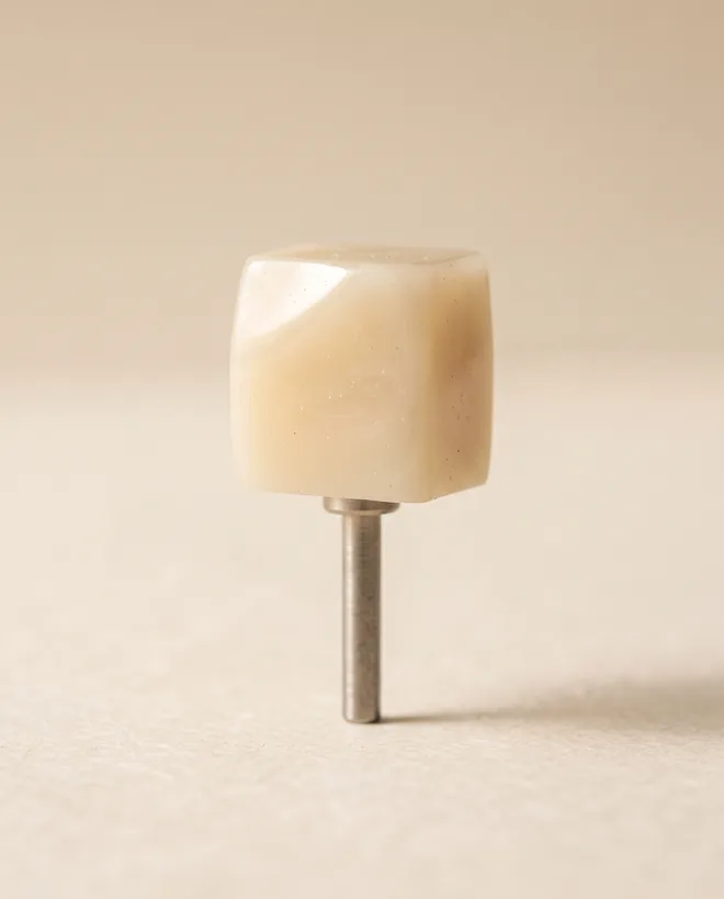 A small square ceramic CAD/CAM milling block