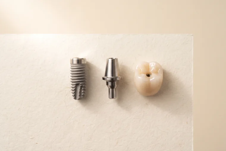 Three components laid in a row on warm off-white paper