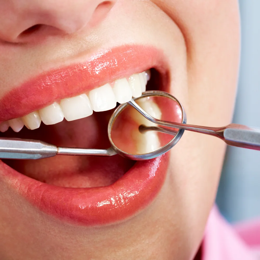 Patient receiving restorative dental treatment to repair and strengthen damaged teeth