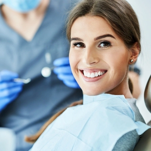Smiling female patient sitting comfortably during a cosmetic dentistry consultation at Mountain View Family Dental